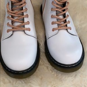 white and rose gold doc martens